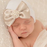 Newborn Baby Girl White Hospital Beanie Hat With Soft Gold Satin Bow & Pearl Rhinestone Jewel Infant Hat Newborn Hat